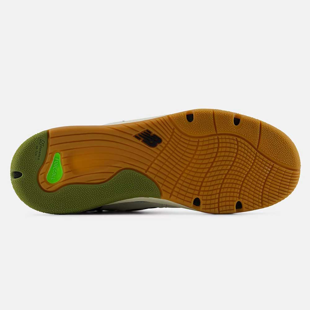 The sole of the 1010 B Tiago Lemos Sea Slate Dark Olivine New Balance Numeric Suede Skateboarding Shoe showcases a combination of gum, green, and black rubber textures with a visible FuelCell label near the heel and a black New Balance logo in the center, delivering peak performance as seen in this pro-endorsed skateboarding model from New Balance.