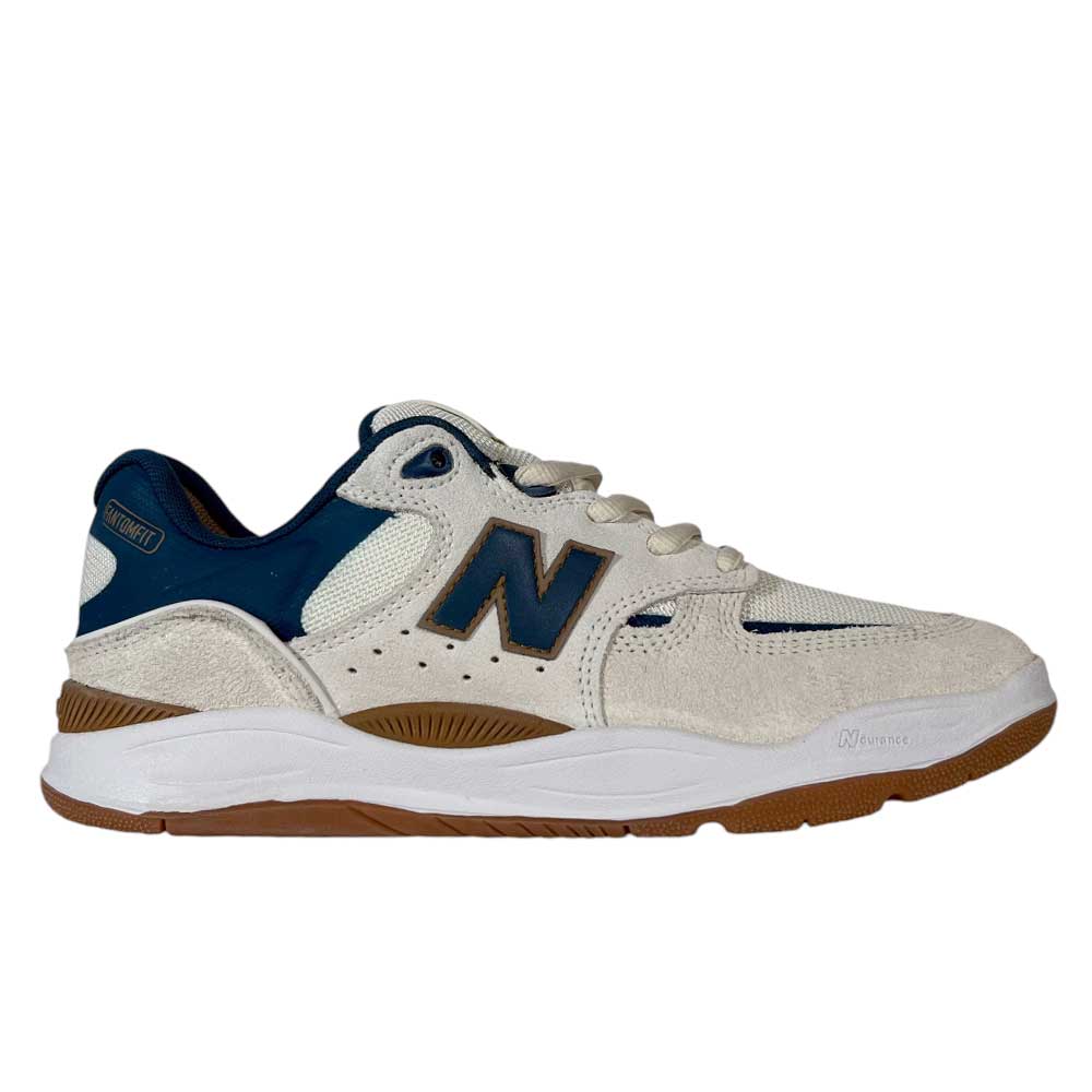 The 1010 BL Tiago Lemos Beige Blue Suede New Balance Numeric Skateboarding Shoes feature beige and navy suede uppers, white laces, a thick white midsole, and a brown rubber outsole—perfect for fans of Tiago Lemos skate style.