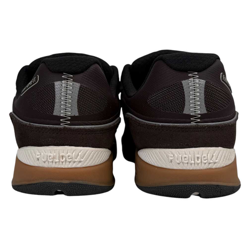 Rear view of the 1010 BN Tiago Lemos Brown Black Suede New Balance Numeric Skateboarding Shoes, featuring white stitching, brown and white soles, and “FuelCell” embossed on the back to highlight the pro model design.