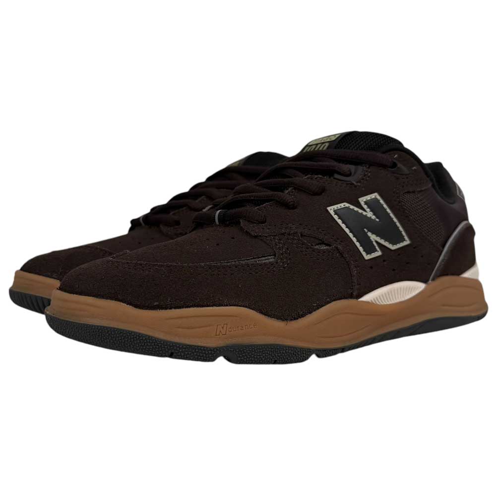 A pair of 1010 BN Tiago Lemos Brown Black Suede New Balance Numeric skateboarding shoes with brown soles, white midsoles, and the signature white and black N logo on the sides, positioned at an angle facing left.