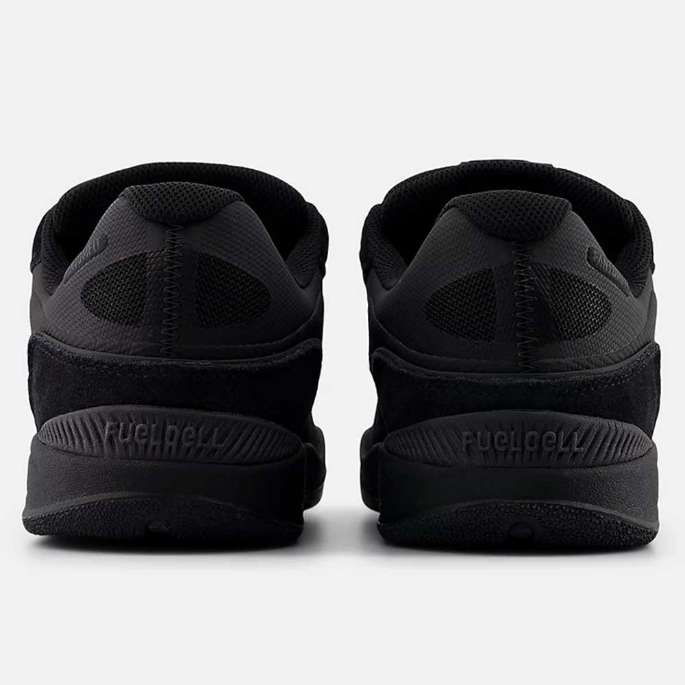 A pair of 1010 CR Tiago Lemos Black New Balance Numeric suede skateboarding shoes viewed from the back, highlighting textured details and heel branding embossed on each durable sneaker.