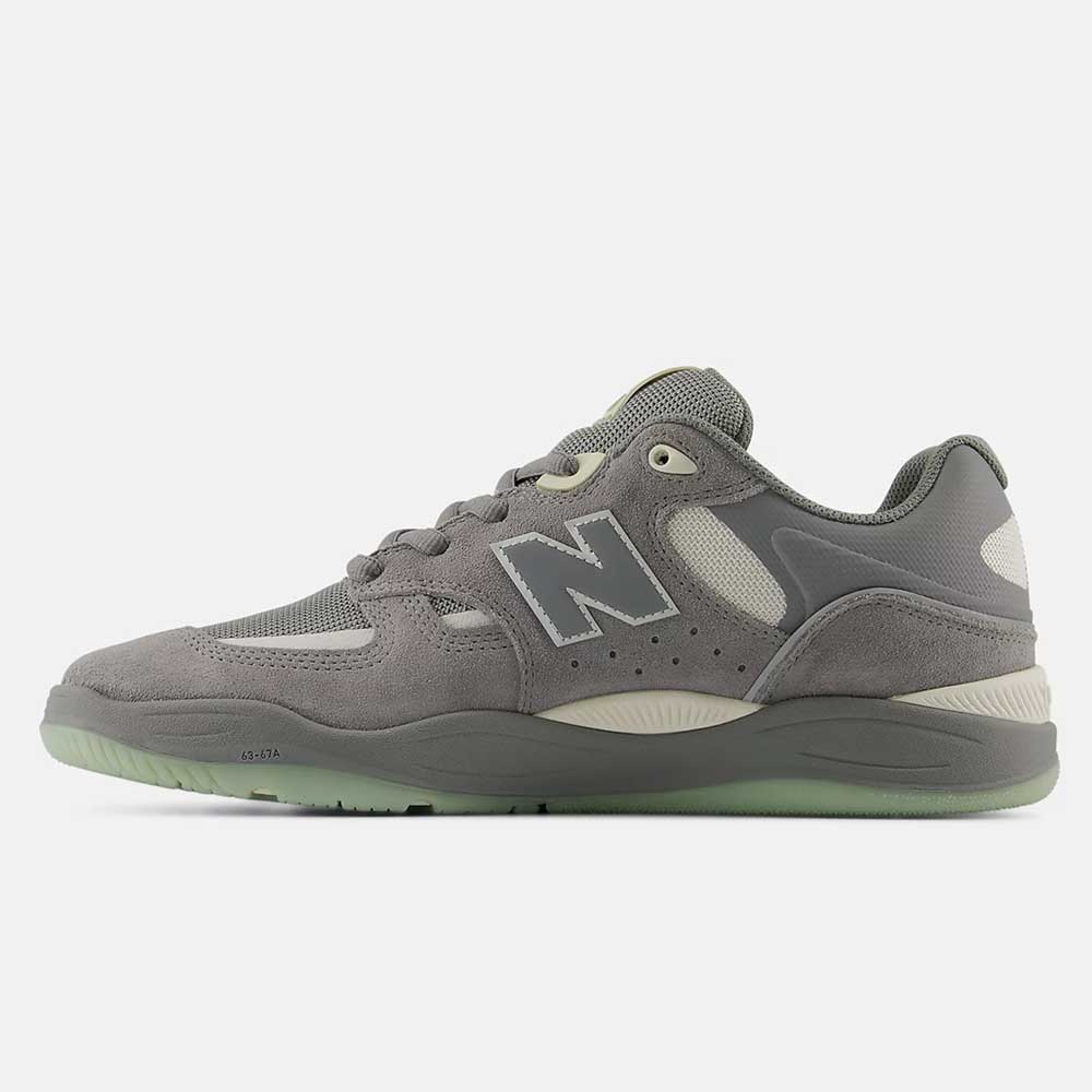 The 1010 PS Tiago Lemos Slate Grey Sea Salt New Balance Numeric Suede Skateboarding Shoe features gray mesh and suede panels, a light green translucent sole, ABZORB midsole cushioning, and the signature N logo in a side profile view.