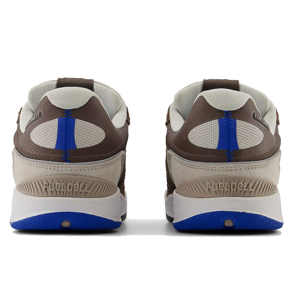 Rear view of 1010 SV Village Psychic Tiago Lemos Gray Blue Suede New Balance Numeric Skateboarding Shoes featuring gray, blue, and beige suede uppers, mesh panels, and blue accents on the heel and sole.