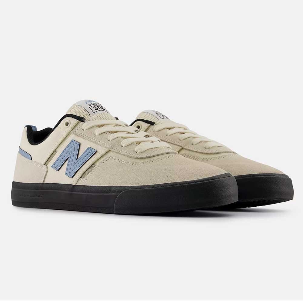 A pair of 306 SBB Jamie Foy Sea Salt Still Water New Balance Numeric suede skateboarding shoes with light blue “N” logos, black soles, and white laces are positioned side by side on a white background.