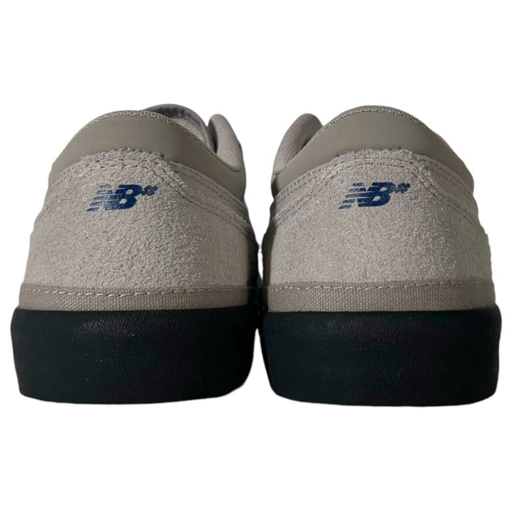 Back view of 417 LSB Franky Villani Grey Black Suede New Balance Numeric skateboarding shoes, featuring black soles and blue logos on the heel, inspired by Franky Villani.