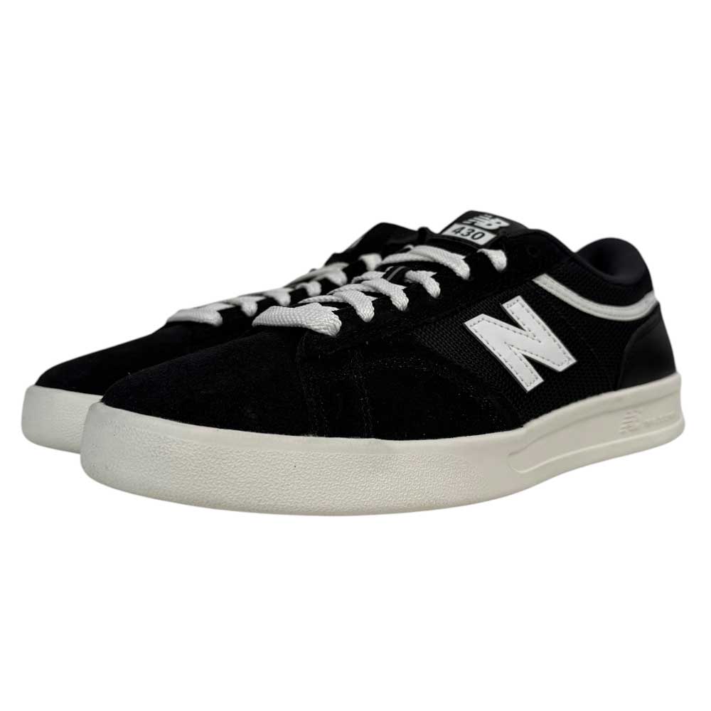 A pair of 430 BWH New Balance Numeric Suede Skateboarding Shoes in black and white with white laces, cushioned midsole, white soles, and a white N logo on the side, positioned at an angle on a plain background.