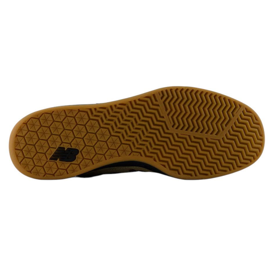 Durable gum rubber sole of the 440 HAW New Balance Numeric Suede Skateboarding Shoes, featuring a geometric tread pattern, a heel logo, and an ABZORB midsole.