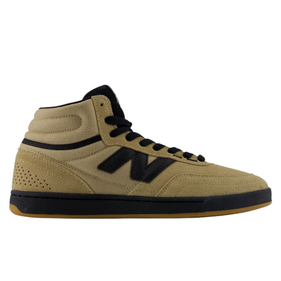 Tan mid-top 440 HAW New Balance Numeric Suede Skateboarding Shoes featuring black laces, a black side logo, and a black ABZORB midsole atop a gum rubber outsole.