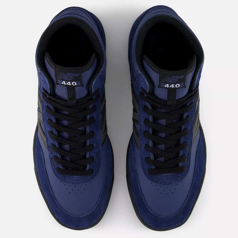 A pair of Vintage Indigo Black 440 HNN New Balance Numeric suede skateboarding shoes, seen from above with black laces, perforated toe boxes, "440" and "NB" tongue branding, and a comfortable ABZORB midsole.