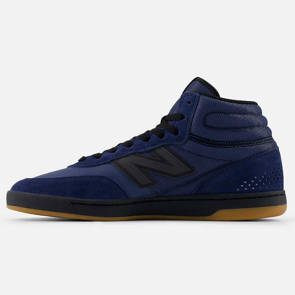 The Vintage Indigo Black 440 HNN New Balance Numeric Suede Skateboarding Shoes feature a navy high-top design with black accents, black laces and N logo, a gum rubber sole, perforated suede and mesh upper, plus an ABZORB midsole for comfort.