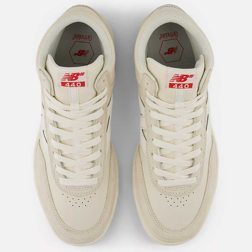 A top-down view of the Timberwolf White New Balance Numeric 440 HTW Suede Skateboarding Shoes, featuring red and white tongue labels with the New Balance logo and 440 branding, designed for durability and everyday wear.