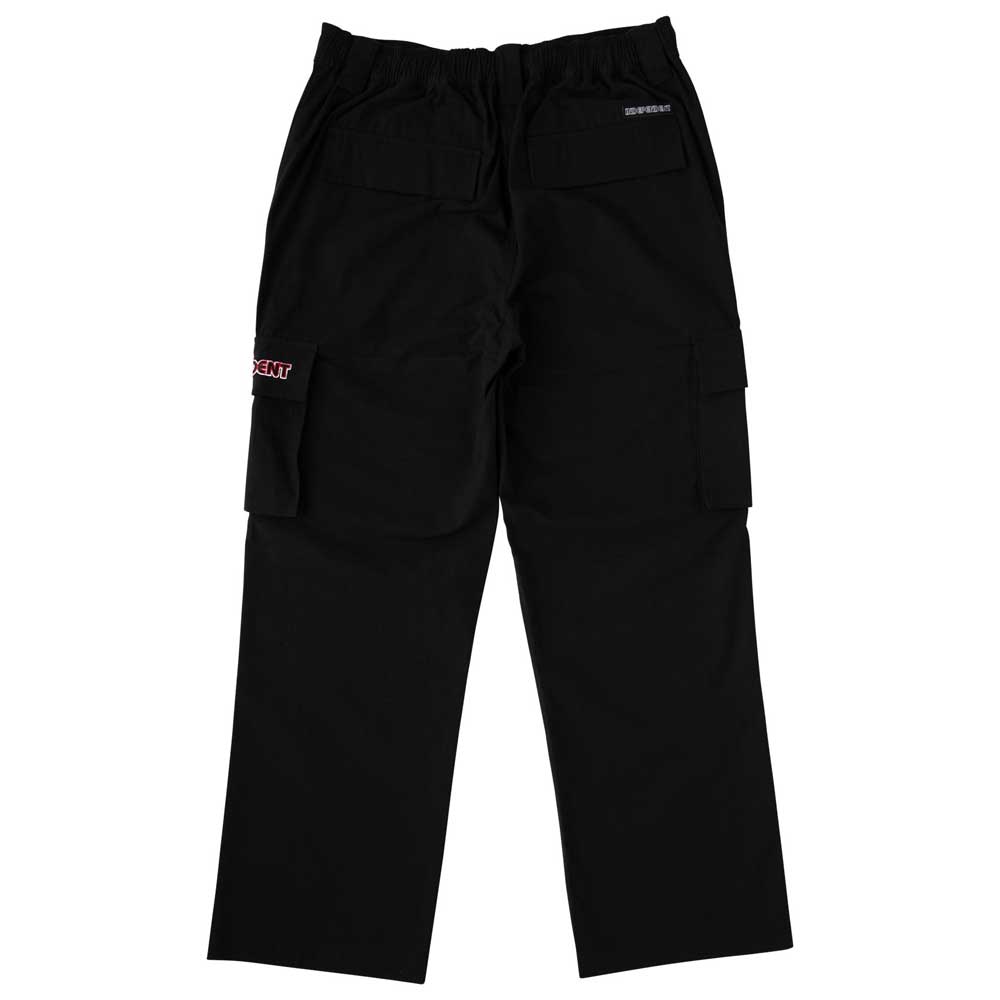 The 44643574 Groundwork Cargo Pants in black ripstop feature two rear pockets, side cargo pockets, an elastic waistband, and a small red and white patch on the left pocket—classic style from Independent.