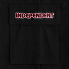 The 44643574 Groundwork Cargo Pants in black ripstop feature a bold red and white INDEPENDENT embroidery on the pocket flap, capturing the signature style of Independent Trucks mens apparel.