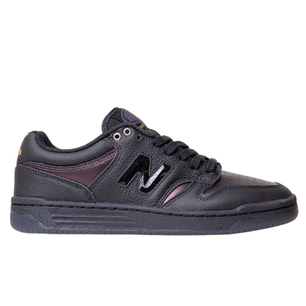The 480 BFK Bronze 56K New Balance Numeric Skateboarding Shoe features a black iridescent suede upper, black N logo, black laces, and a low-cut profile, shown in side view against a white background.