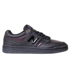The 480 BFK Bronze 56K New Balance Numeric Skateboarding Shoe features a black iridescent suede upper, black N logo, black laces, and a low-cut profile, shown in side view against a white background.