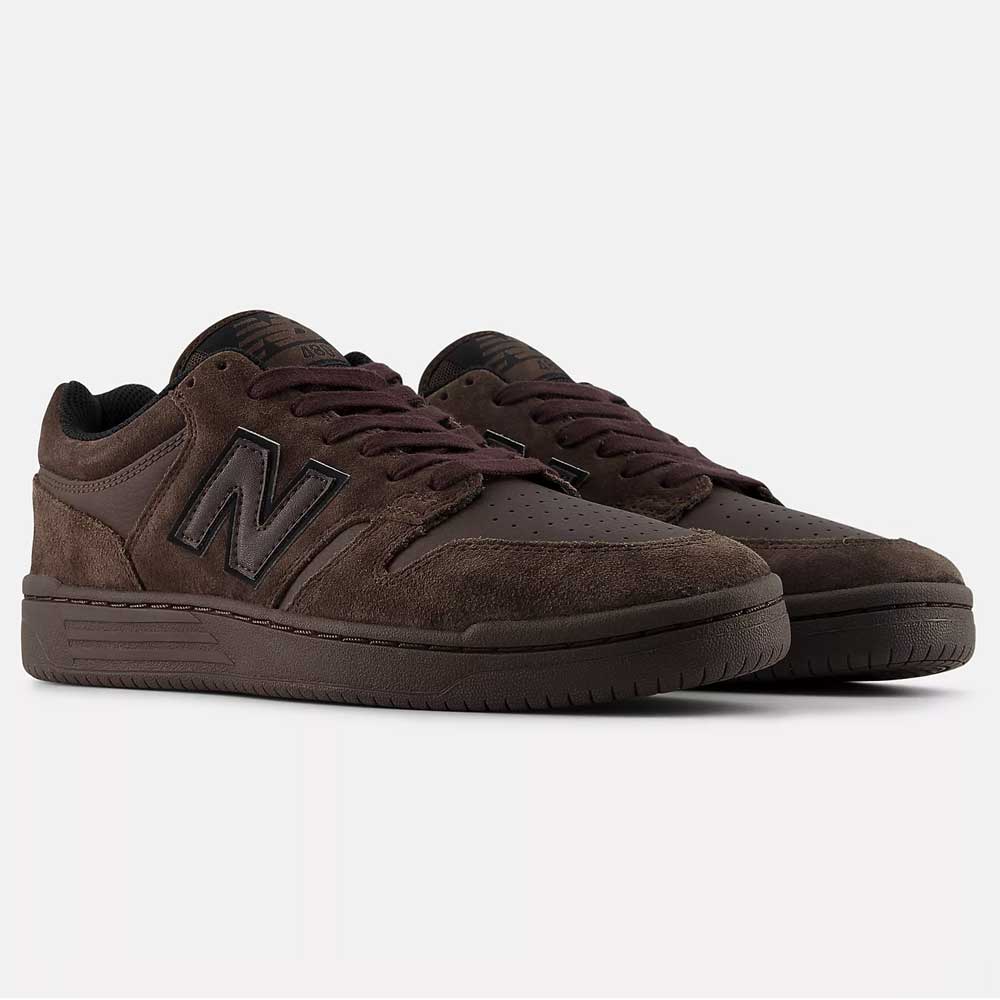 A pair of Chocolate Brown 480 CHC New Balance Numeric suede skateboarding shoes with black accents and gum soles, displayed side by side on a light background.