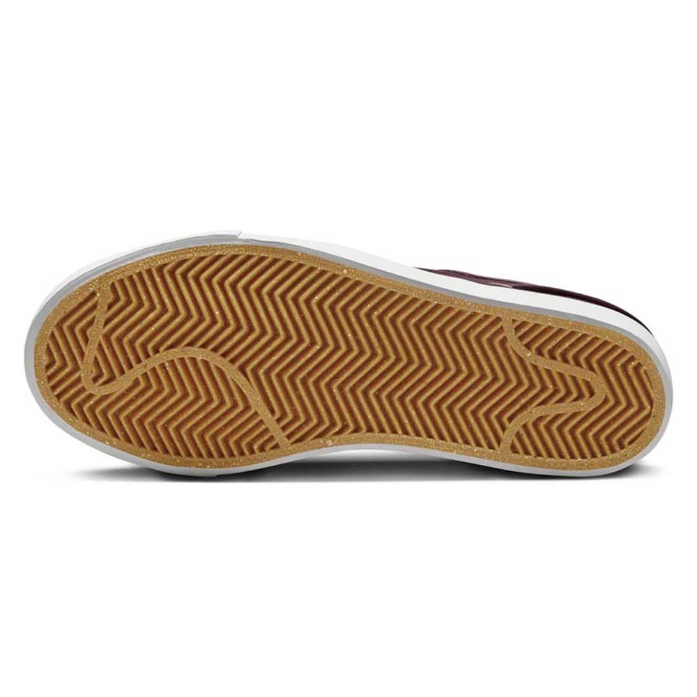 The image shows the sole of the 525104607 Burgundy Crush Black Janoski OG Nike SB Suede Skateboarding Shoe, featuring a brown herringbone tread pattern and a white midsole, viewed from the bottom.