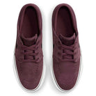A pair of Nike SB 525104607 Burgundy Crush Black Janoski OG suede skateboarding shoes with white soles, laces, black Swoosh logos on the sides, and Zoom Air cushioning, viewed from above.