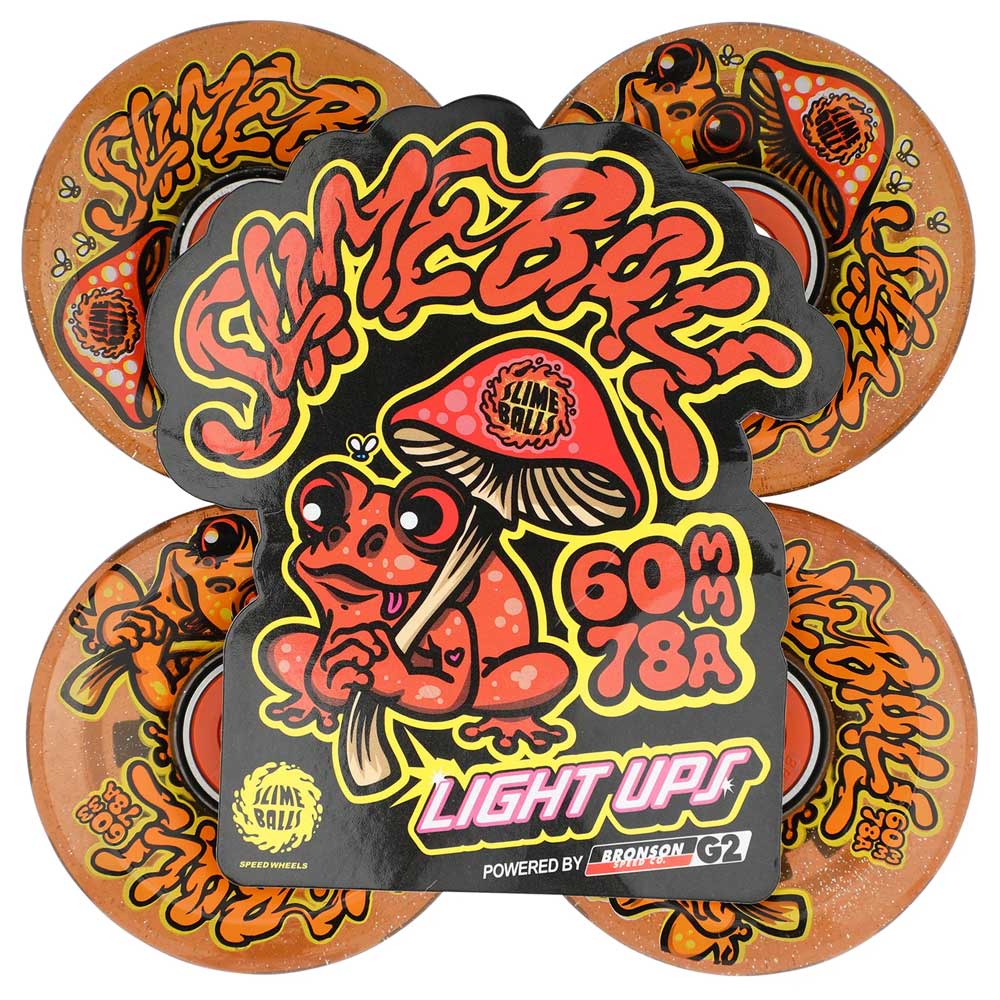 Deck out your ride with 60mm Frog Trips Light Ups OG Slime Red Glitter 78a Slime Balls Wheels—bright orange wheels featuring fun frog and mushroom art, plus LED lights for a unique, stylish skateboard look.