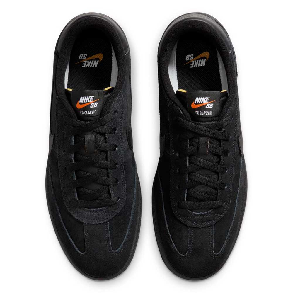Top view of 909096002 Black Vivid Orange FC Classic Nike SB suede skateboarding shoes with black laces, soles, and Nike SB logo, plus vivid orange accents on the comfy Solarsoft insole.