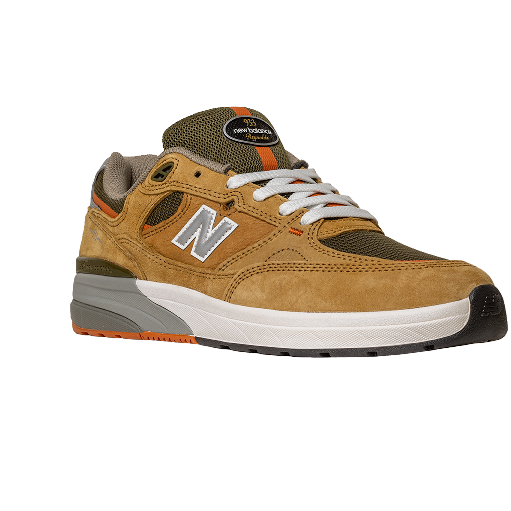 The 933 MNO Andrew Reynolds Brown Grey New Balance Numeric Skateboarding Shoes feature a suede design, ideal for skateboarding.