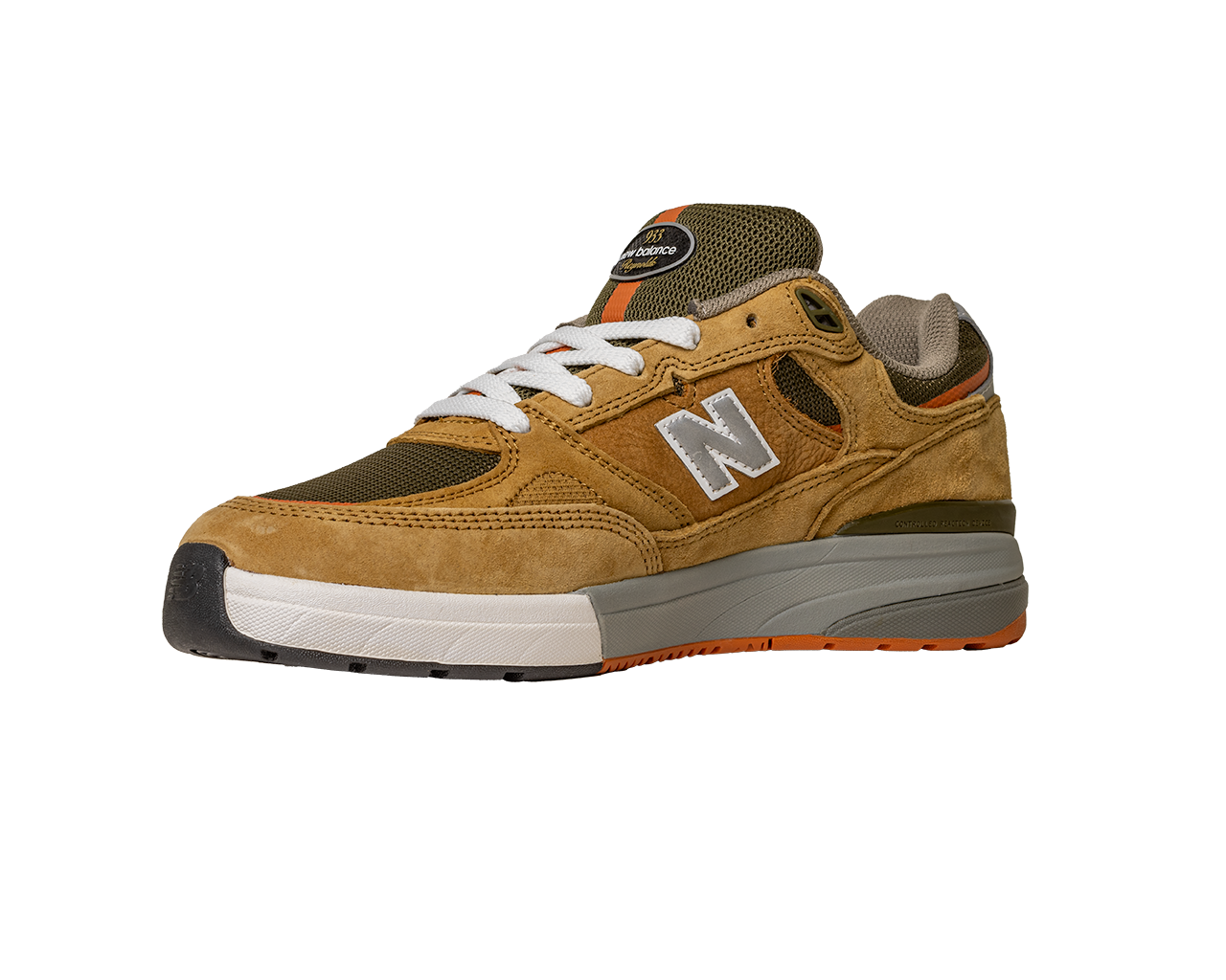 The 933 MNO Andrew Reynolds Brown Grey New Balance Numeric skateboarding shoe features a suede upper, white laces, gray and white sole, and orange accents, shown on a plain white background.
