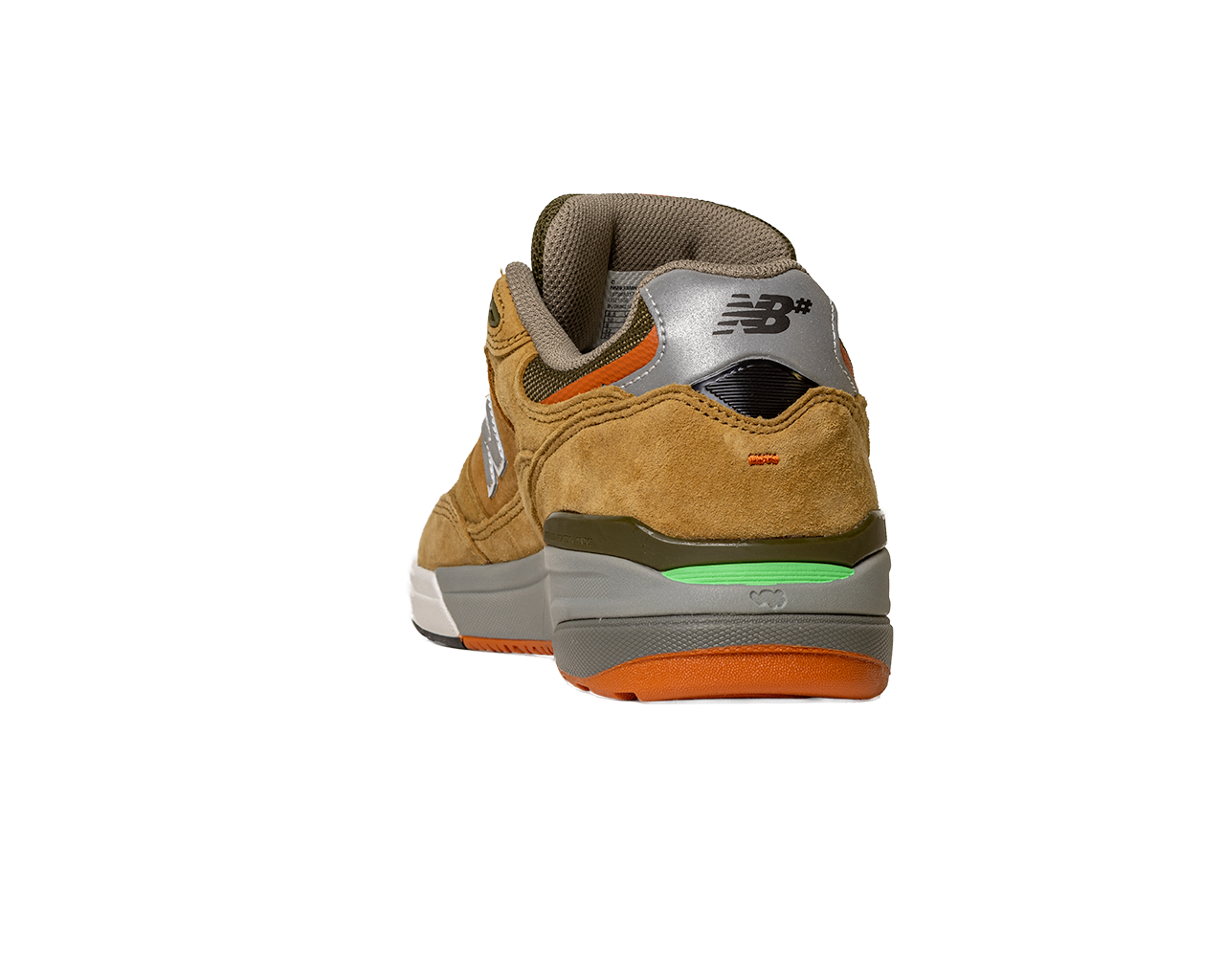 The 933 MNO Andrew Reynolds Brown Grey New Balance Numeric Skateboarding Shoe features tan suede, a gray heel with the New Balance logo, a green accent above the sole, and an orange outsole, shown from the back on a white background.