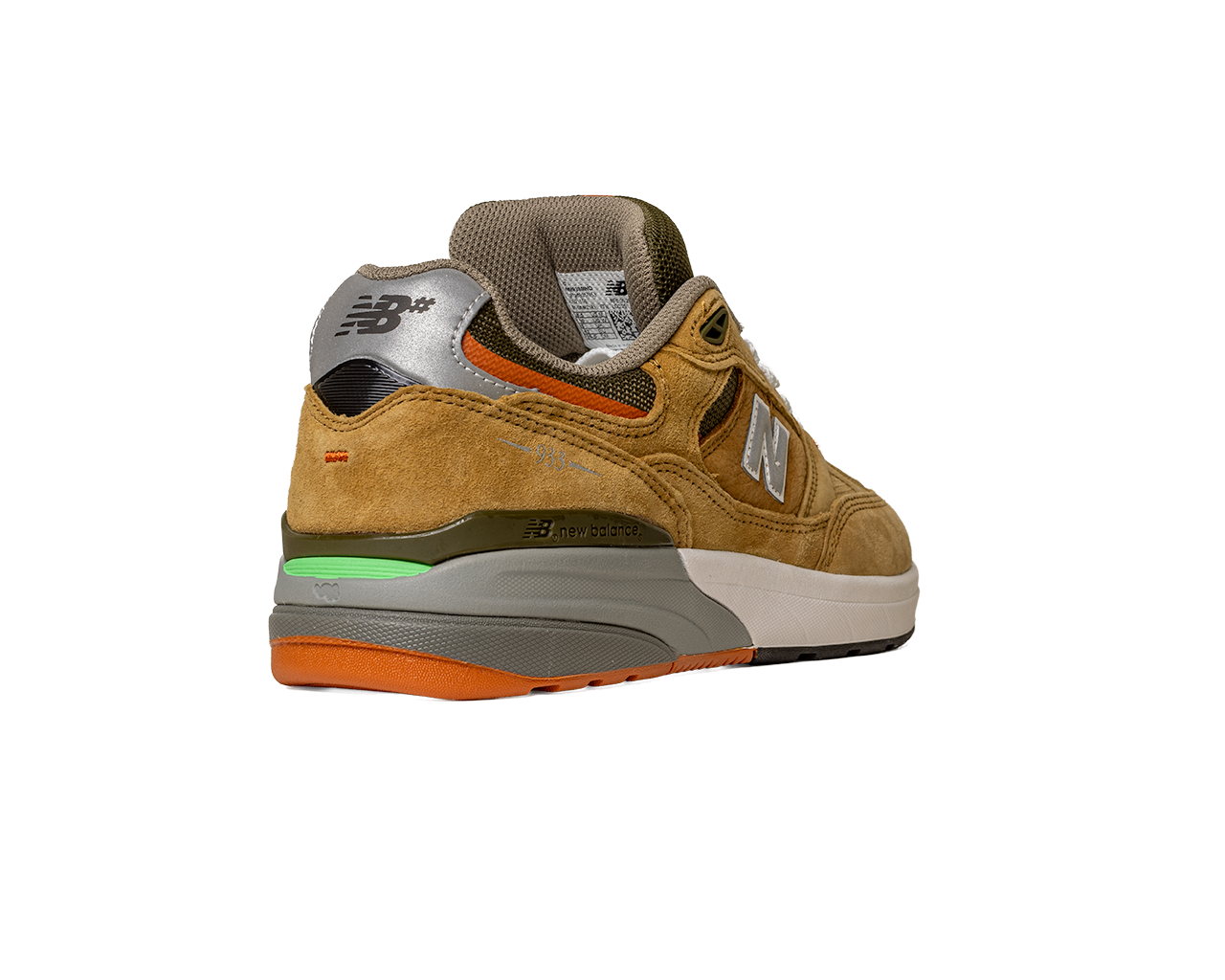 The 933 MNO Andrew Reynolds Brown Grey New Balance Numeric Skateboarding Shoes Suede feature a tan suede upper, silver heel with logo, grey midsole, orange outsole, and green accents above the heel, shown from the back angle.