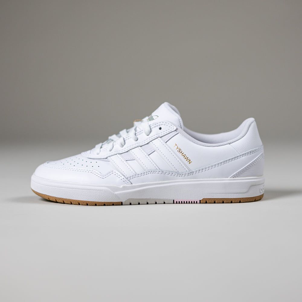 The JQ1130 Cloud White Tyshawn 2 II Adidas leather skateboarding shoes feature classic three stripes, cupsole construction, a gum sole, and TYSHAWN in gold near the laces, set against a plain gray background.