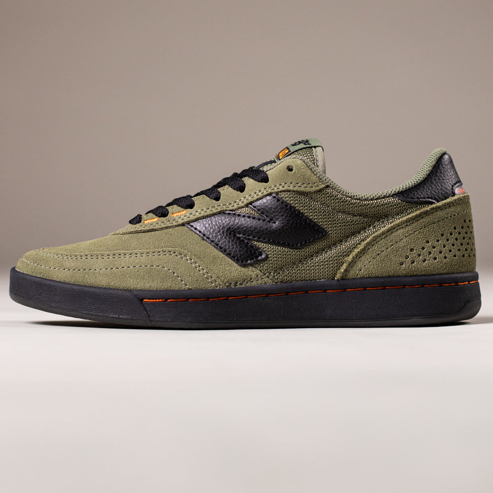 The 440NL2 Dark Olivine Black New Balance Numeric Suede Skateboarding Shoes features an olive green upper, black sole and laces, black N logo, ABZORB midsole, and perforated heel detail, shown side view on a neutral background.