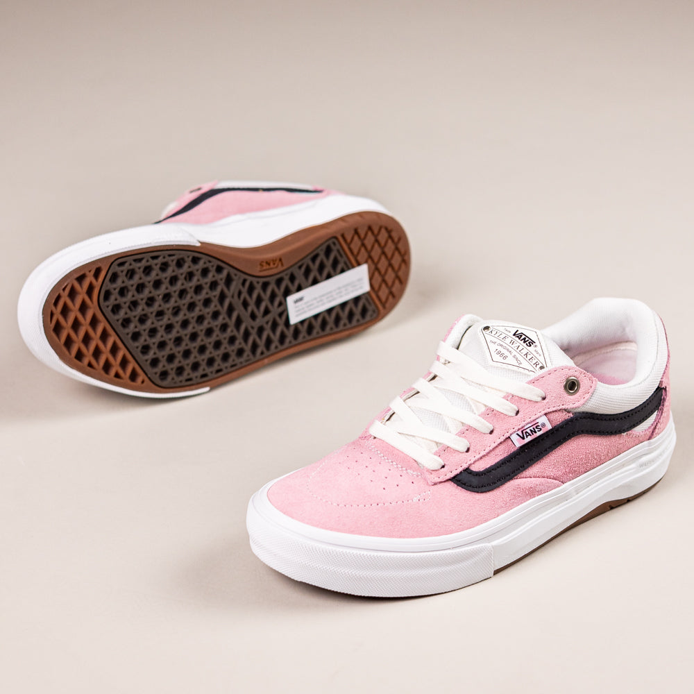 The VN000DA4PNK1 Skate Kyle Walker Wafflecup Pink Vans Skate Suede Rubber Shoes feature pink suede, white laces, black side stripe, white soles, and brown waffle-patterned outsoles—ideal for skateboarding style.
