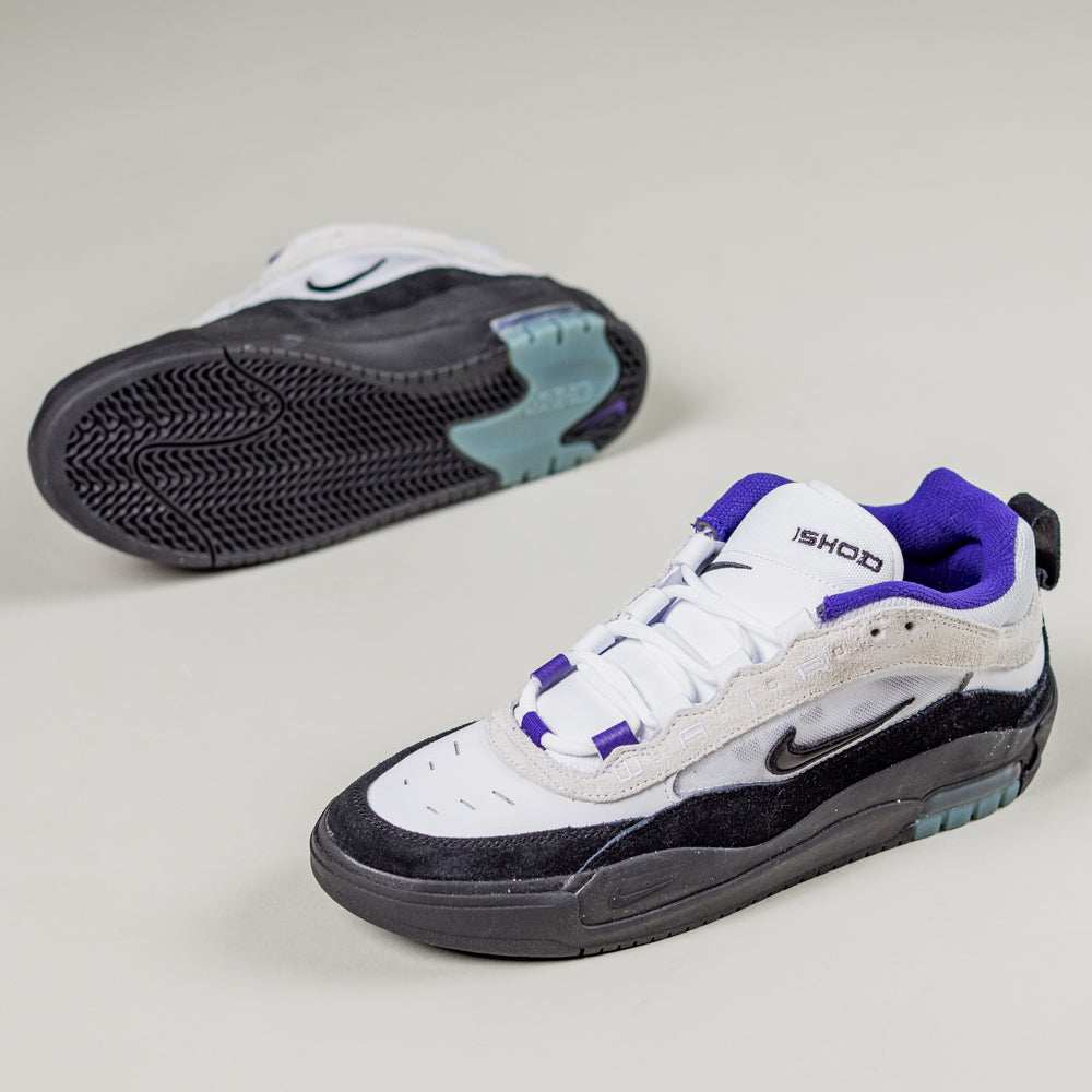 A pair of FB2393104 White Black Court Purple Denim Air MAX Ishod Nike SB Suede Leather Skateboarding Shoes are shown on a light background, one upright to display the design, and the other on its side to highlight the Max Air-cushioned sole.