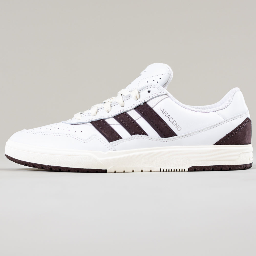 The JQ1620 Crystal White Brown Zach Saraceno Tyshawn 2 Adidas Skateboarding Shoes feature a white leather upper with black stripes, black heel detailing, and "SARACENO" on the side, displayed on a plain light grey background.
