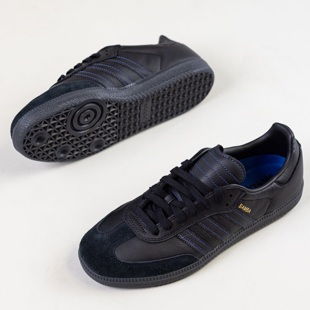 A pair of JR2059 Black Black Samba ADV Adidas Skateboarding Leather Suede Shoes, shown against a white background. One shoe highlights the side and top view, while the other displays the textured sole and molded sockliner.