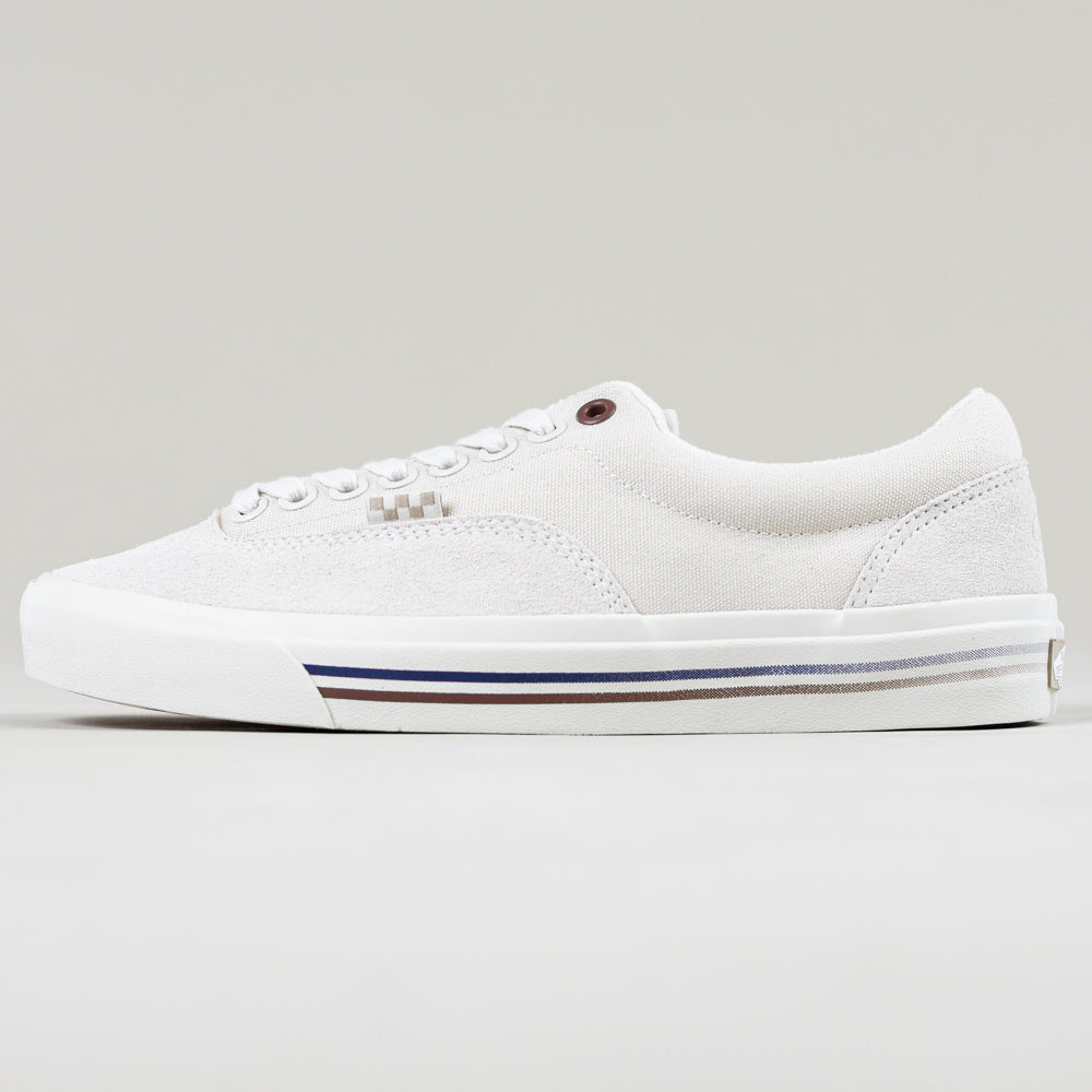 The VN000DA3TUP1 Dime Skate Era Stub Taupe Vans Suede Skateboarding Shoes are low-top white sneakers with white laces, a textured upper, and a rubber sole with blue and tan stripes, shown on a neutral background.