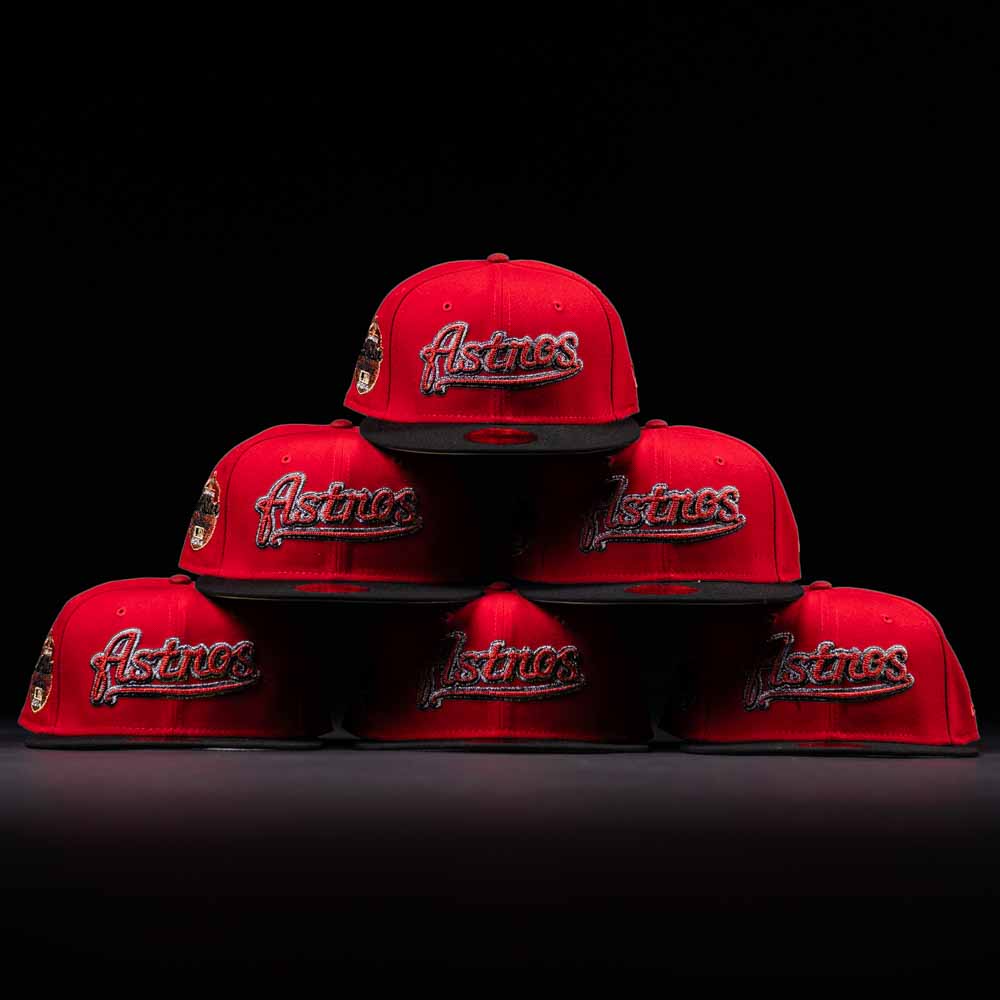 Six red Samurai Japan ASG Houston Astros New Era Hat 5950 Fitted caps are arranged in a pyramid against a black background, each featuring the Astros logo embroidered on the front and a side patch.
