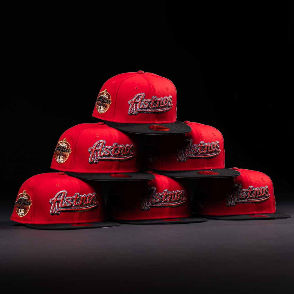 Six red and black Samurai Japan ASG Houston Astros New Era Hat 5950 Fitted caps are arranged in a pyramid against a black background. Each features the Astros logo and a stylish side patch.