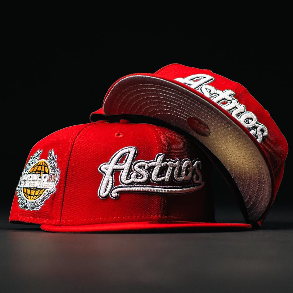 Two Sunnyside Bo Bundy WS05 Houston Astros New Era 5950 fitted hats in red with white embroidered logos. One displays the Astros text and side patch; the other is upside down, showing the underside of the brim.