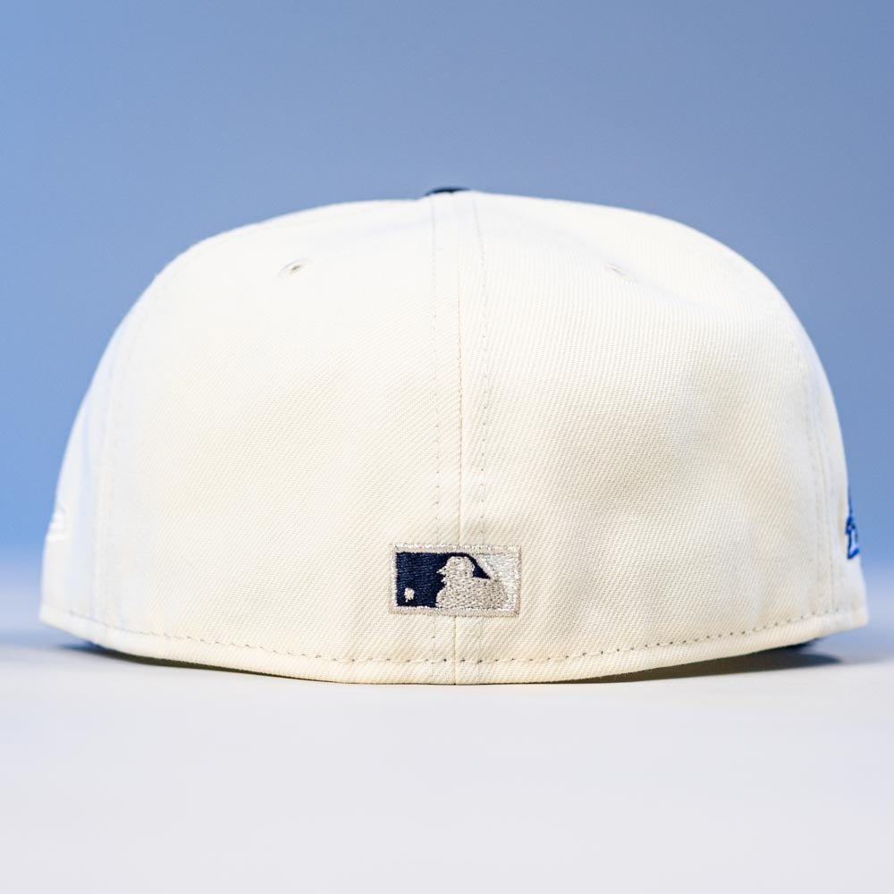 The International Flea Bo Bundy New Era Houston Astros 5950 Fitted Hat in white is shown from the back, with the MLB logo embroidered in navy and white near the bottom center.