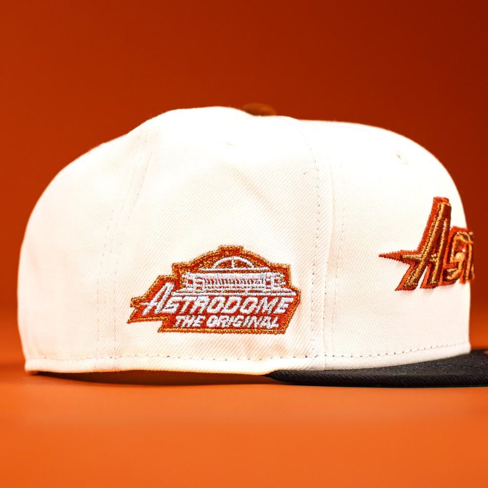 The Rustic Sunset Houston Astros New Era 5950 Fitted Hat features a white crown, orange and brown embroidered Astrodome logo, "ASTRODOME THE ORIGINAL" text on the side, and celebrates Houston Astros history with bold orange accents.