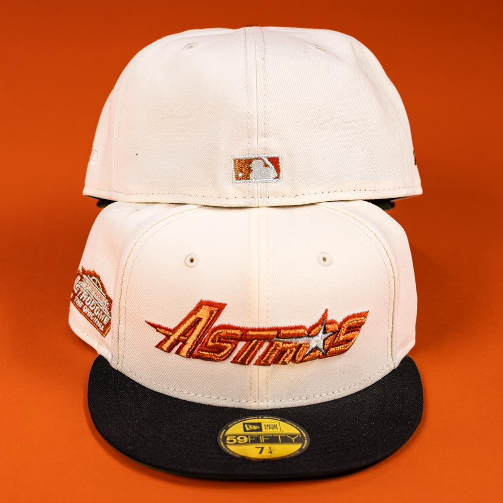 Two Rustic Sunset Houston Astros New Era Hat 5950 Fitted caps—one showing the front logo and "59FIFTY" sticker, the other backward with the MLB logo—are set against a vibrant orange background.
