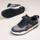 A pair of FN4210-302 Seaweed Red Sepia Medium Ash YOUTH Day One GS Nike SB Shoes with dark blue, brown, and gray mesh and suede uppers, white midsoles, and black patterned outsoles featuring a Zoom Air unit, displayed on a light background.