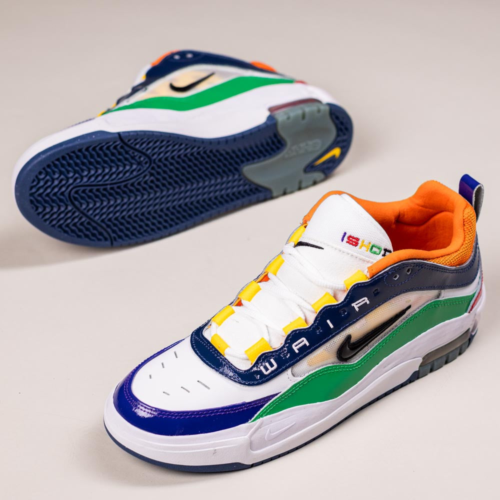 A pair of HV1670600 University Red Black Amarillo Navy Air MAX Ishod Nike SB suede leather skateboarding shoes is displayed upright to show the side and top, and sideways to reveal the sole and Max Air cushioning.