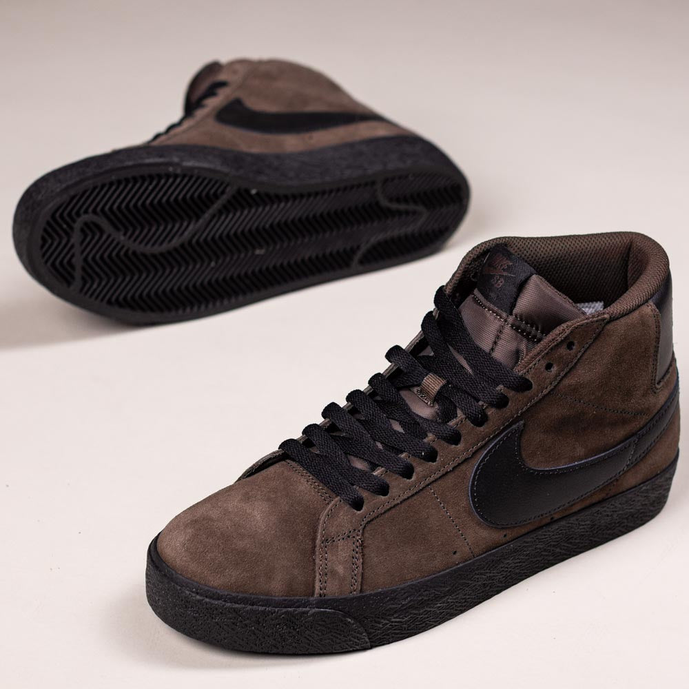 The FD0731201 Baroque Brown Black Blazer Mid Nike SB Suede Skateboarding Shoes feature brown suede uppers, black laces and soles, a black swoosh, responsive cushioning, and are shown from the side and bottom views.
