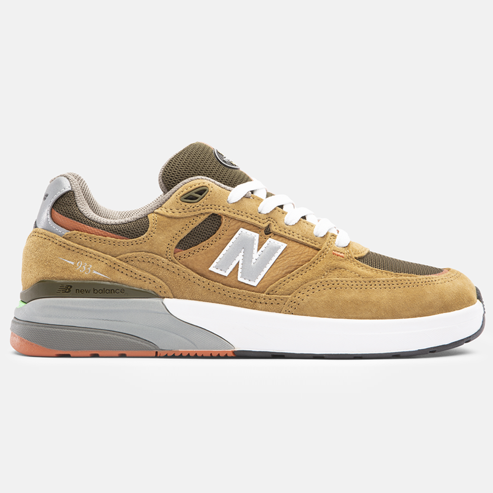 The 933 MNO Andrew Reynolds Brown Grey New Balance Numeric Skateboarding Shoes feature tan and brown suede, white laces, a large white N logo, and gray heel and sole accents, shown in side profile against a plain white background.
