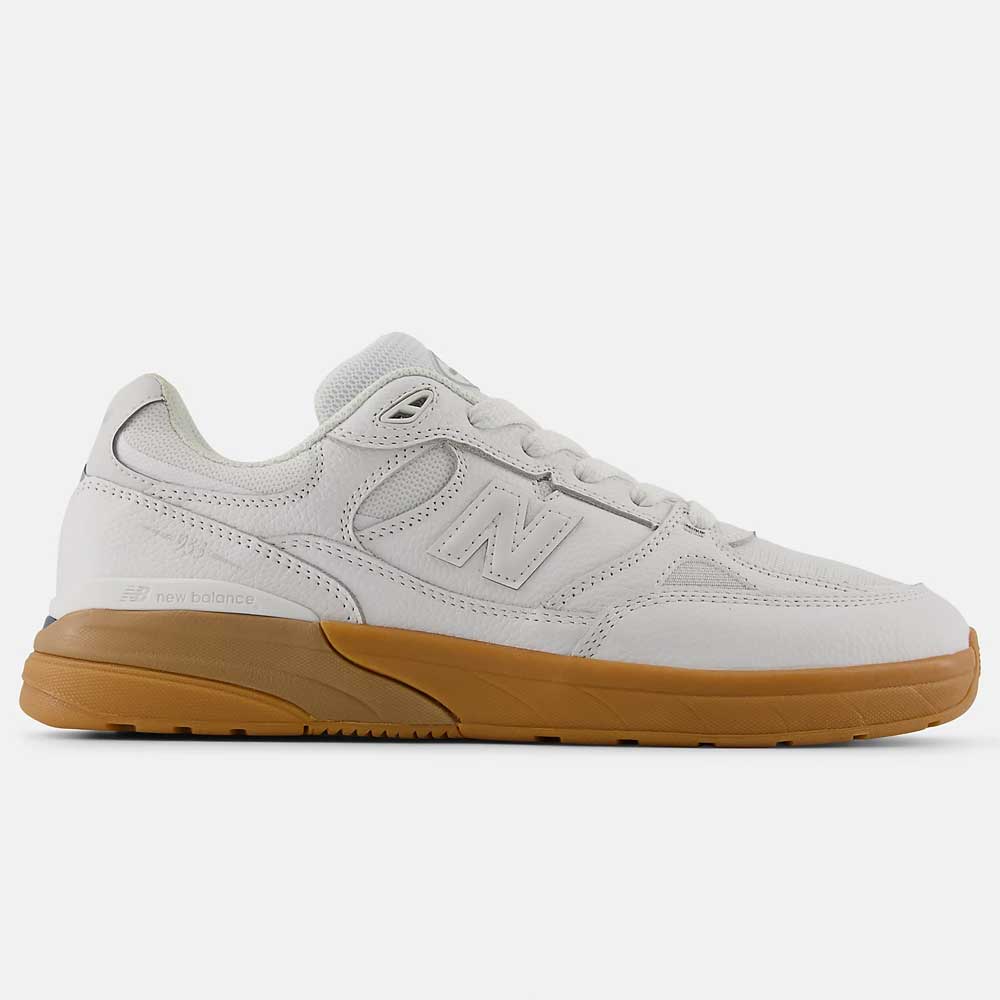 Side view of the 933 WWB White Black Andrew Reynolds New Balance Numeric Suede Skateboarding Shoes, featuring a gum sole, signature N logo, white laces, and a low-top design inspired by Andrew Reynolds' style.