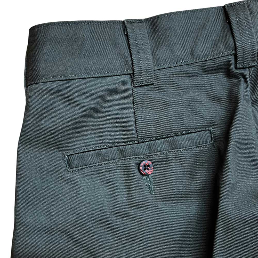 Close-up of the A865R0OG Olive Spitfire Double Knee Dickies Skateboarding Pant in regular fit twill, featuring a belt loop, waistband, single back pocket with flap and dark button, and durable, slightly textured fabric.