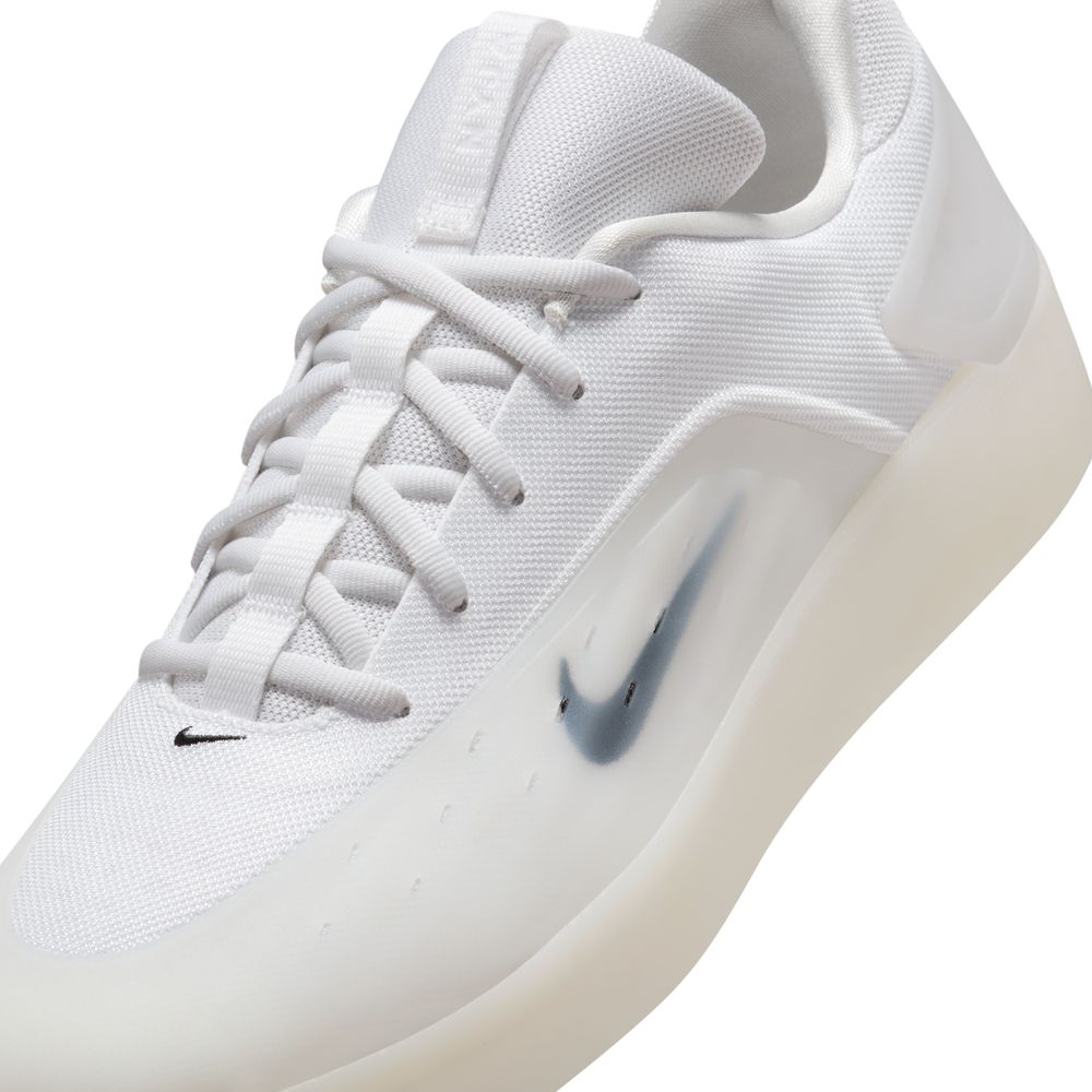 The FQ1273-100 White Black Zoom Nyjah 4 Nike SB Skateboarding Shoe features a white mesh upper, thick HART outsole, white laces, and a silver Nike swoosh for sleek, minimalist style and all-day comfort.