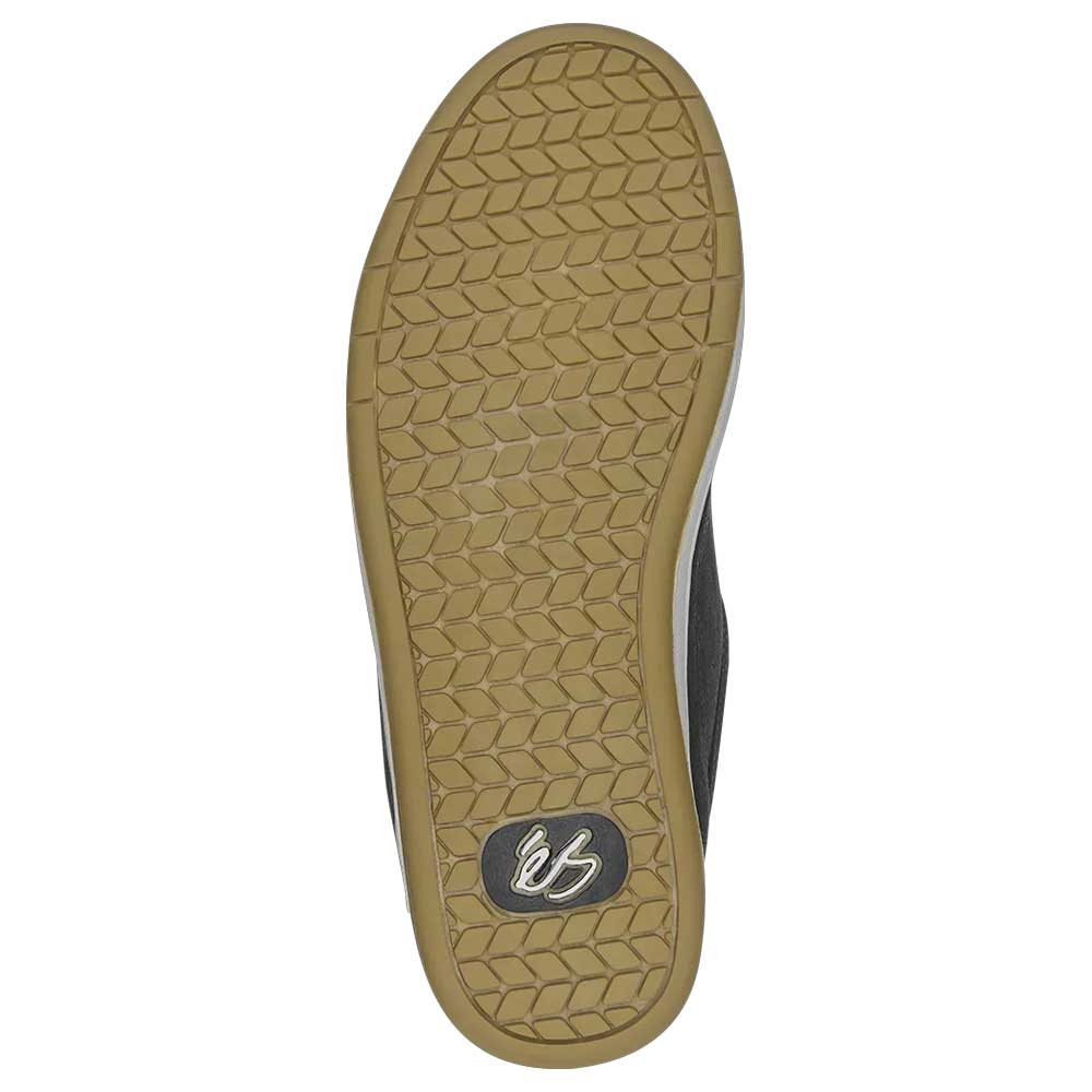 The Accel Black White Suede Es Shoes Skateboarding feature a honeycomb tread sole with a small black and white logo near the heel. The light brown outsole, detailed with black and white accents, is ideal for skateboarding.