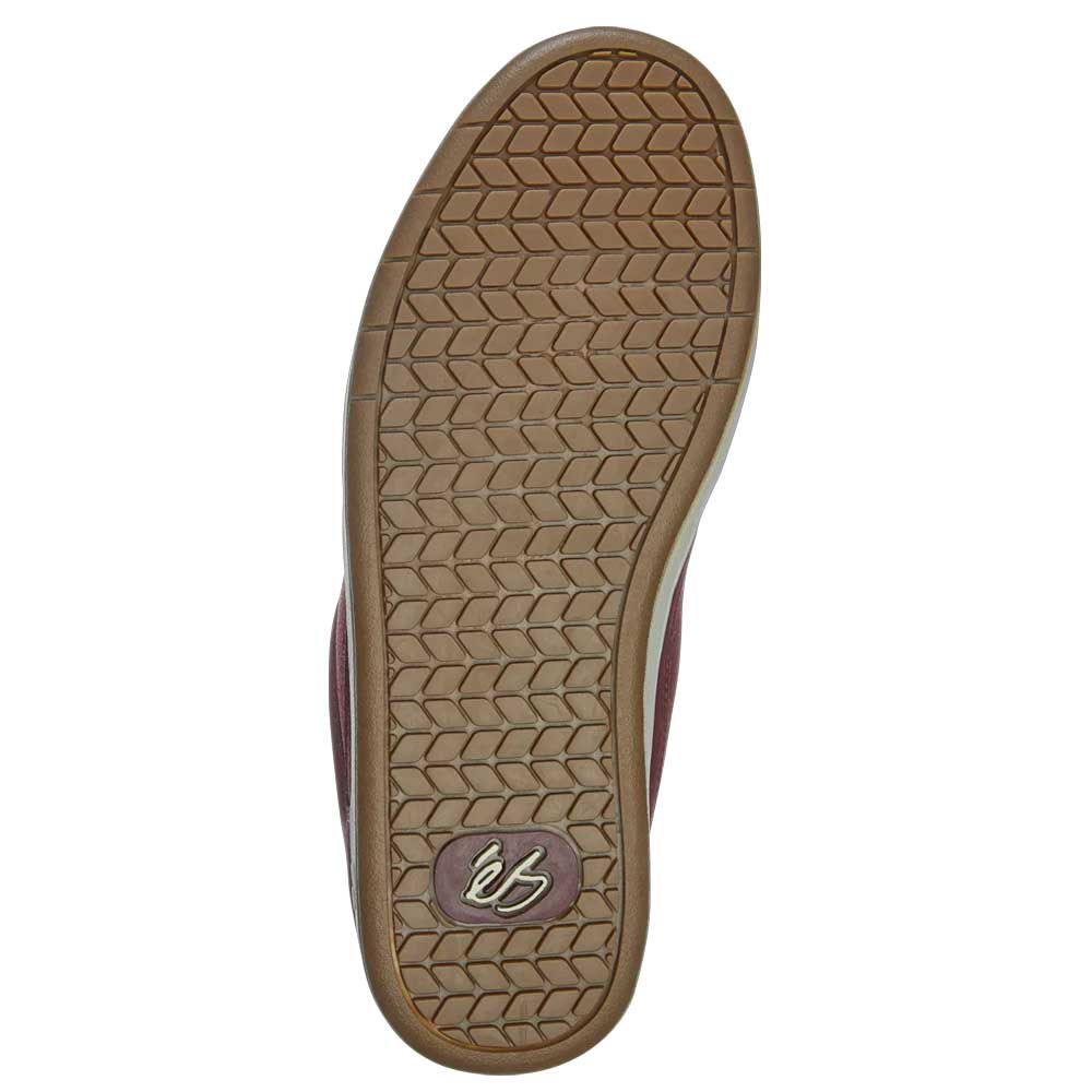 The image displays the sole of the Accel Burgundy White Suede Es Skateboarding shoe, featuring a brown hexagonal tread and a small "eb" logo near the heel.